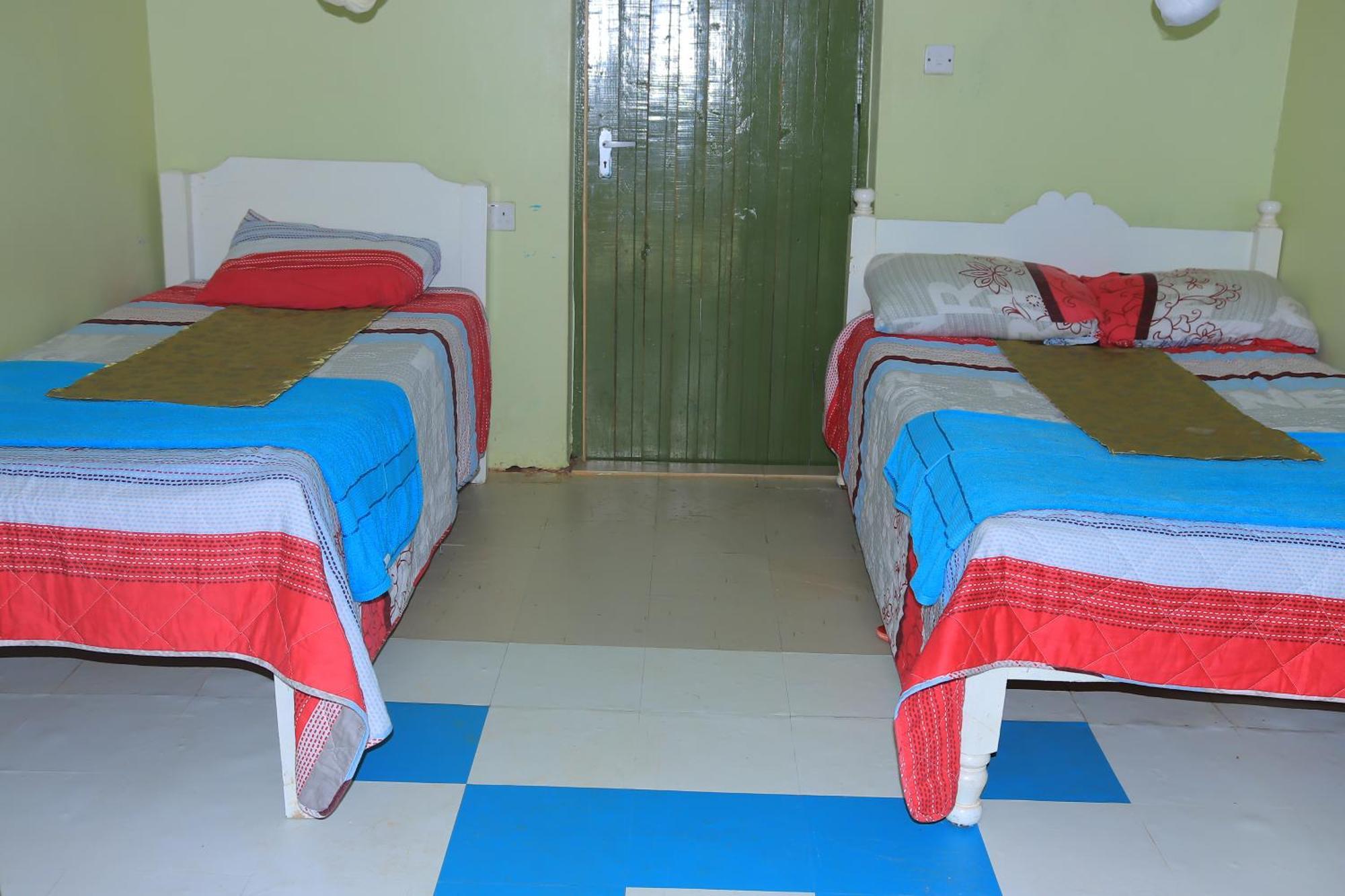 Rhino Tourist Camp Hotel Ololaimutiek Екстериор снимка