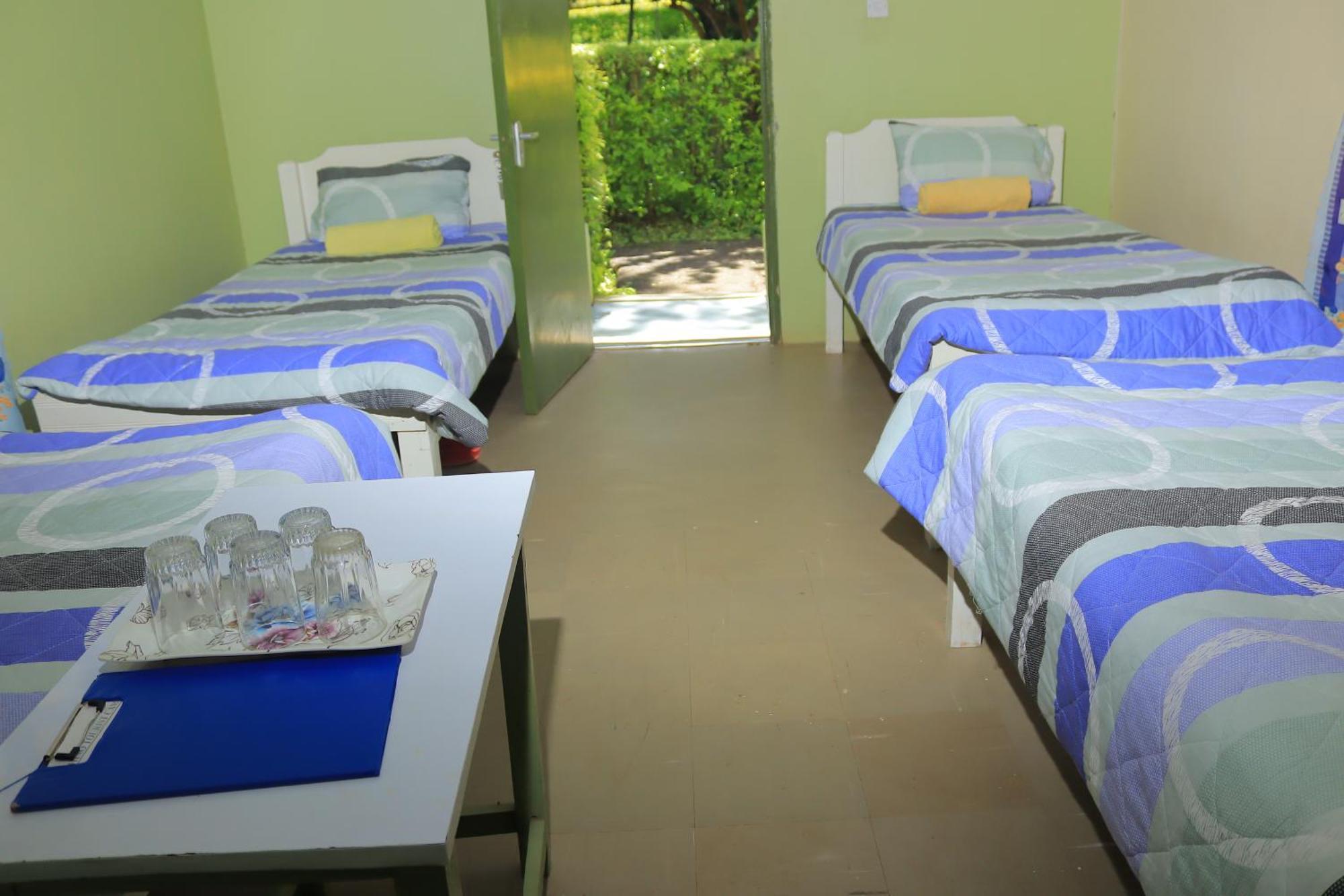 Rhino Tourist Camp Hotel Ololaimutiek Екстериор снимка