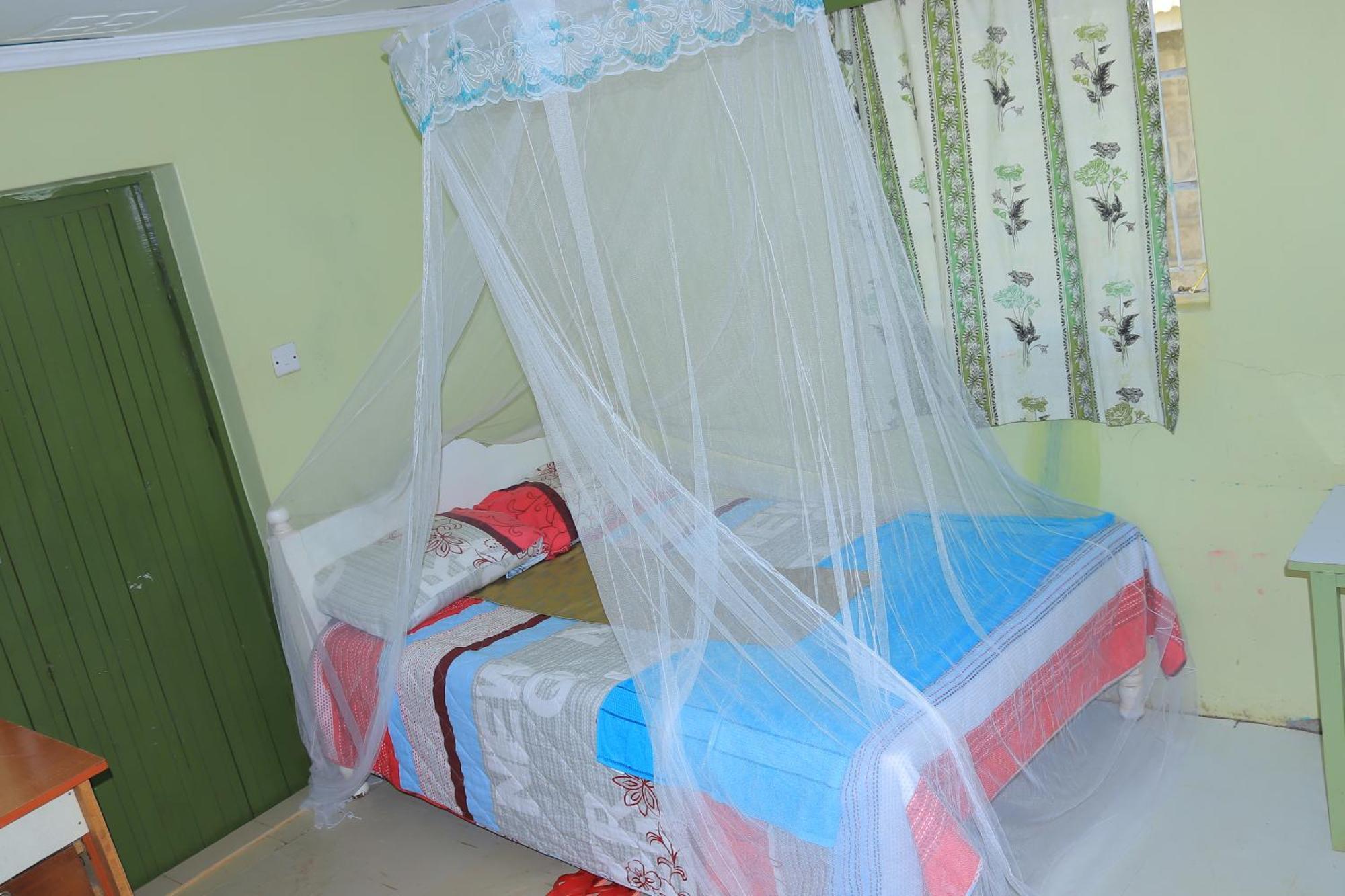 Rhino Tourist Camp Hotel Ololaimutiek Екстериор снимка